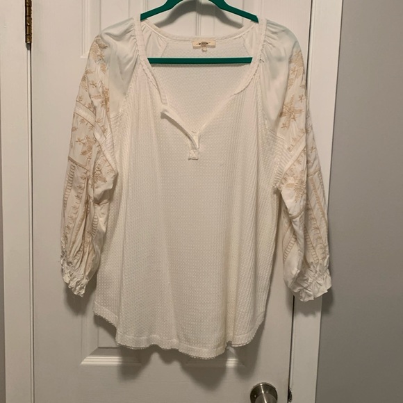 in loom Tops - Like new women’s size, large cream, colored top with embroidery on the sleeves
